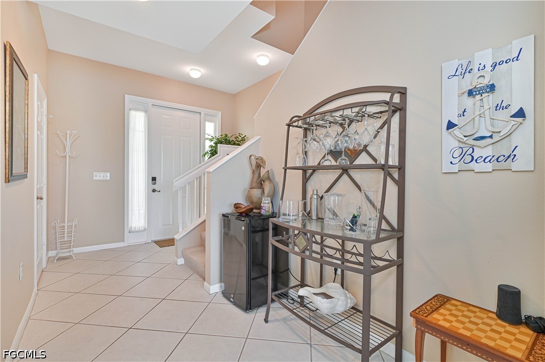 13120 Broadhurst Loop, Unit 505 Fort Myers, FL 33919 - Photo 7 of 28 a view of a hallway with workspace