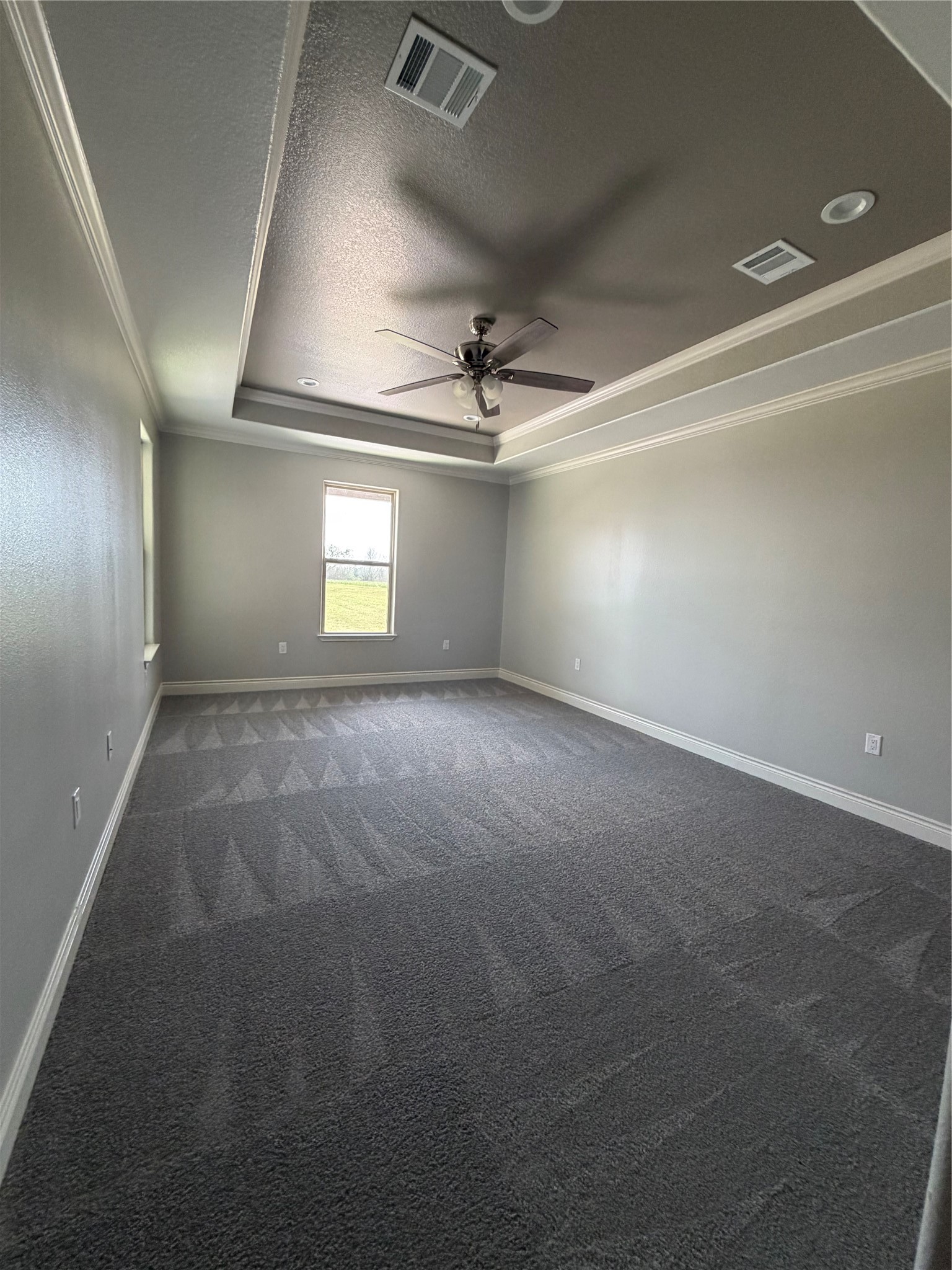 749 Buffalo Trail Angleton, TX 77515 - Photo 15 of 30 an empty room with windows and ceiling fan