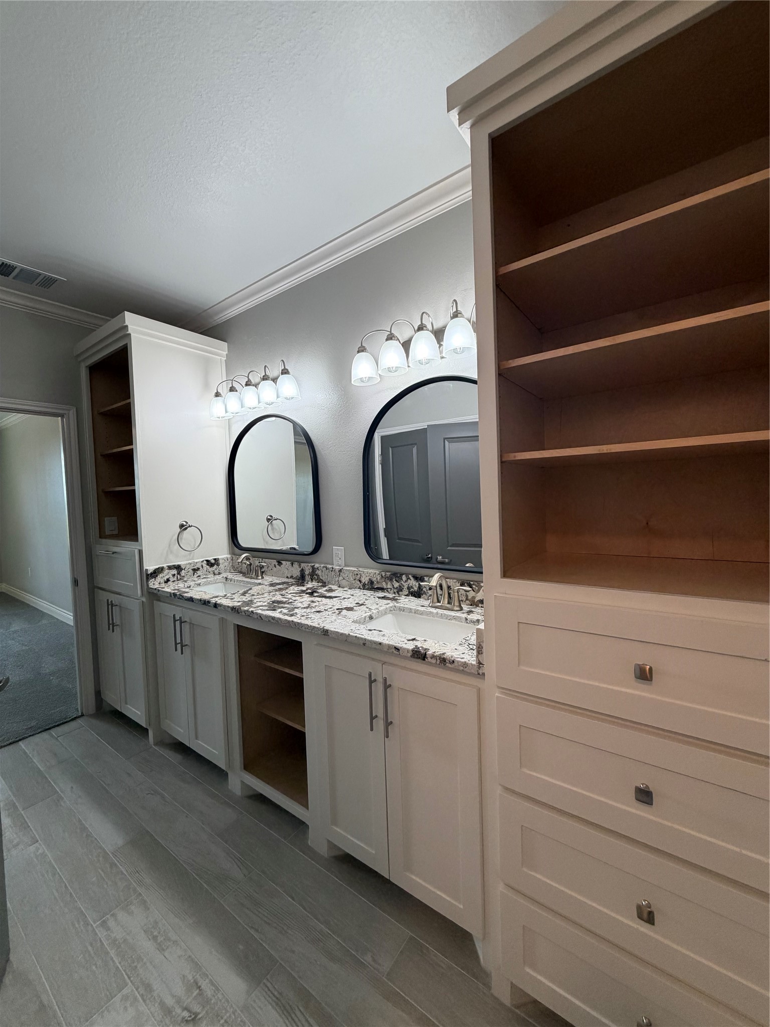 749 Buffalo Trail Angleton, TX 77515 - Photo 16 of 30 a bathroom with double vanity sink and a mirror