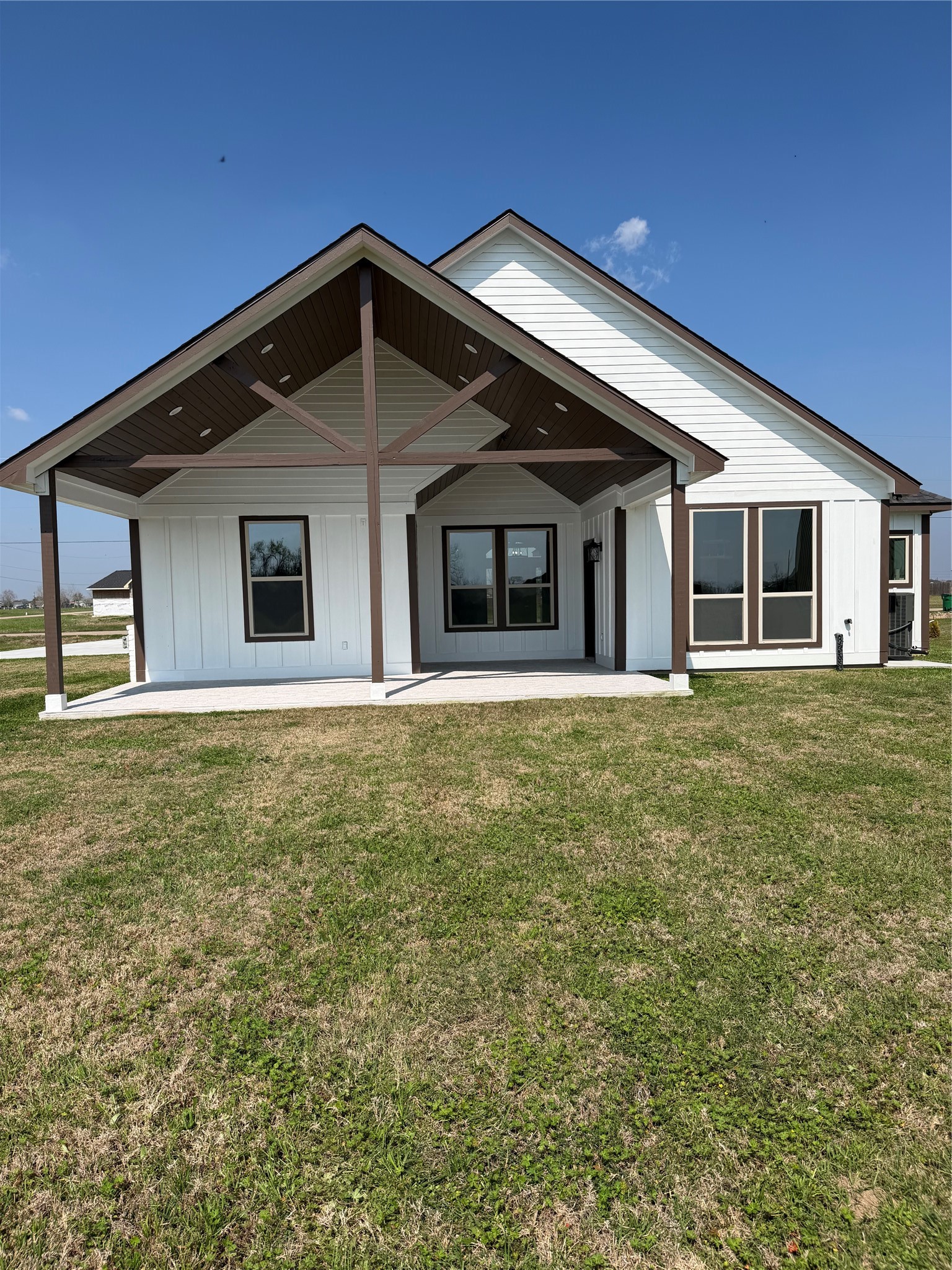749 Buffalo Trail Angleton, TX 77515 - Photo 6 of 30 a front view of a house with a garden