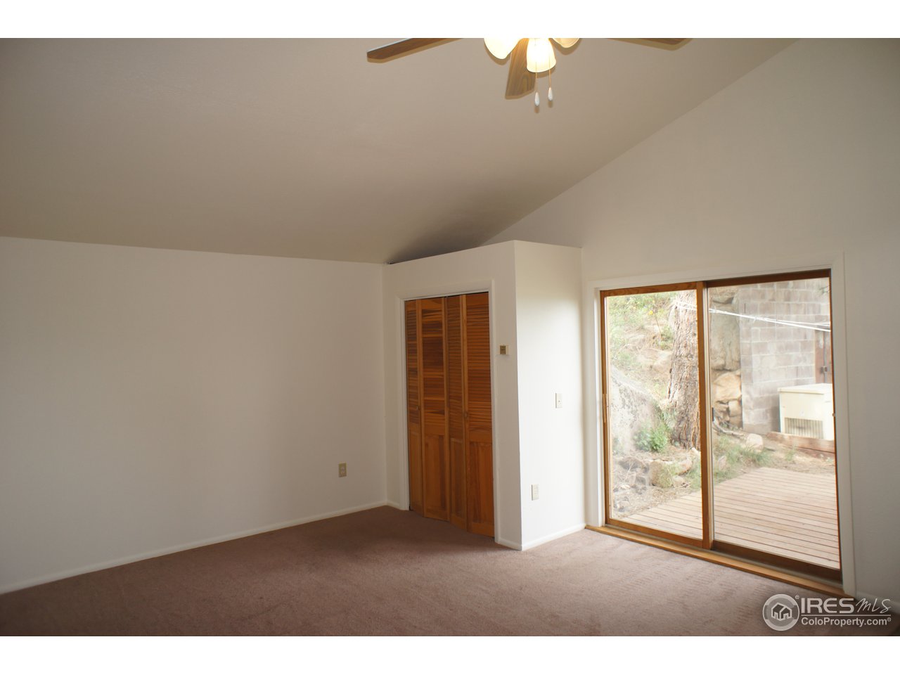 8933 Sugarloaf Road Boulder, CO 80302 - Photo 11 of 25 Master bedroom with private balcony