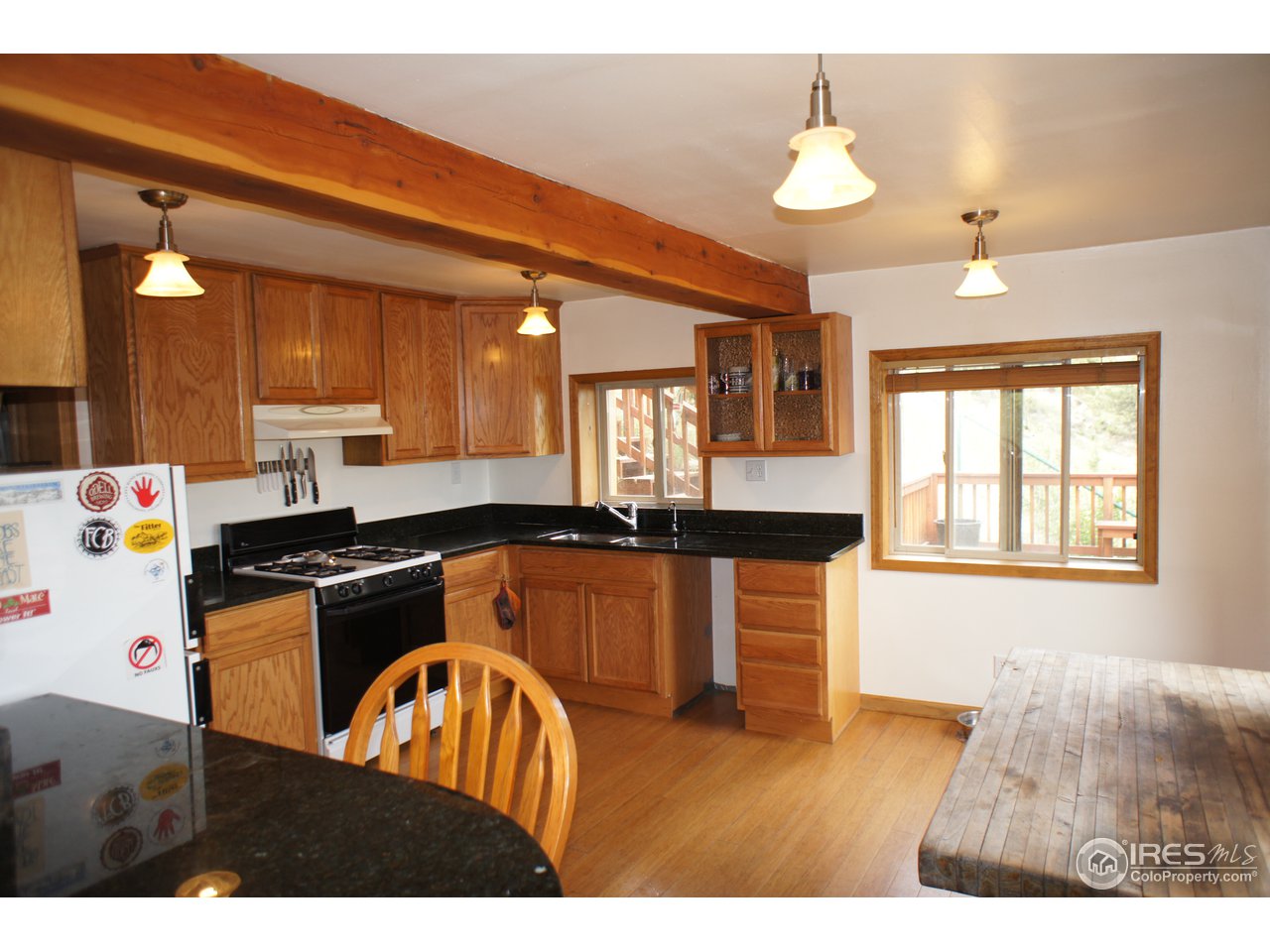 Large kitchen with granite countertops