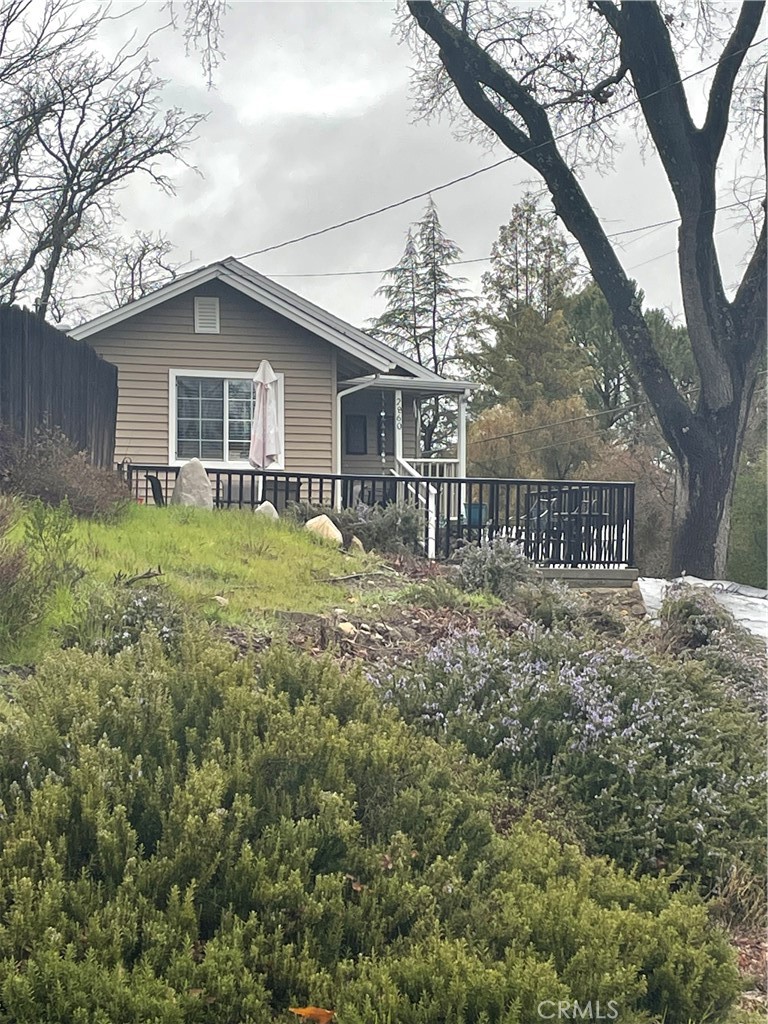 2860 Monterey Road Atascadero, CA 93422 - Photo 1 of 1 a backyard of a house with table and chairs