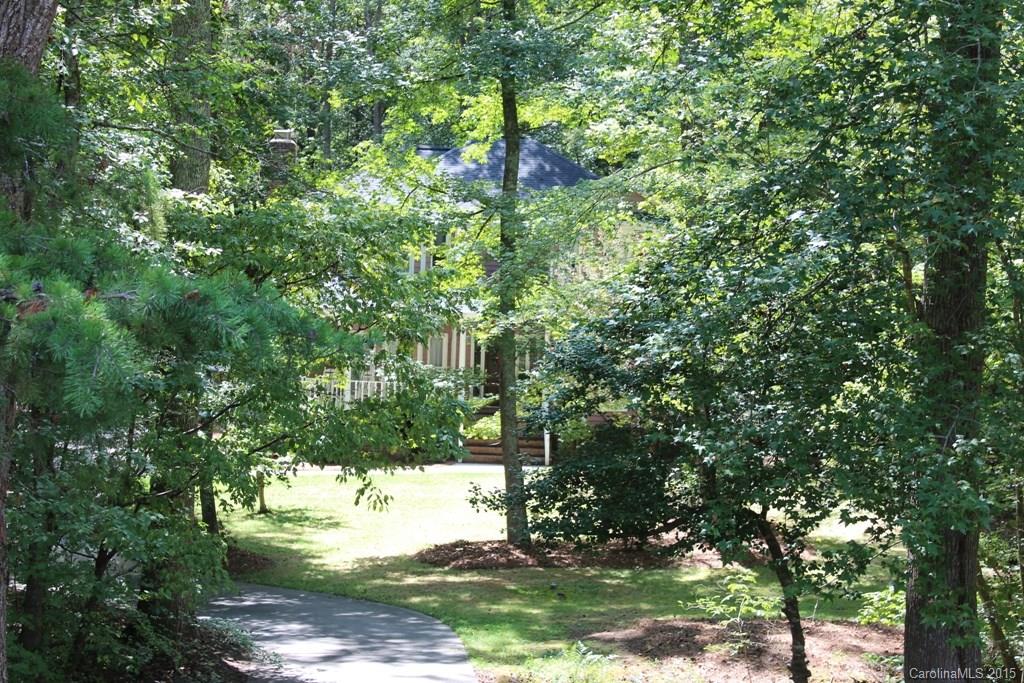 2717 Farmstead Lane, Unit 61 Fort Mill, SC 29708 - Photo 2 of 23 a backyard of a house with a yard and outdoor seating