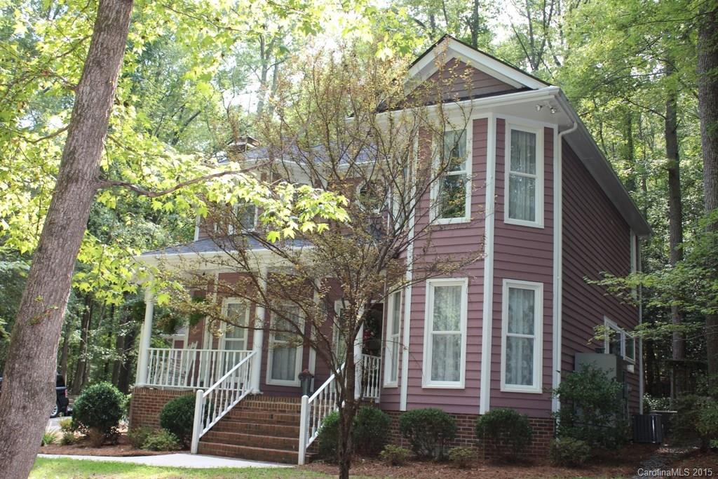 2717 Farmstead Lane, Unit 61 Fort Mill, SC 29708 - Photo 11 of 23 a front view of a house with a tree