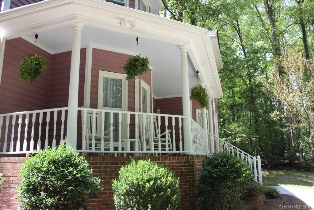 2717 Farmstead Lane, Unit 61 Fort Mill, SC 29708 - Photo 3 of 23 a view of a back yard of the house