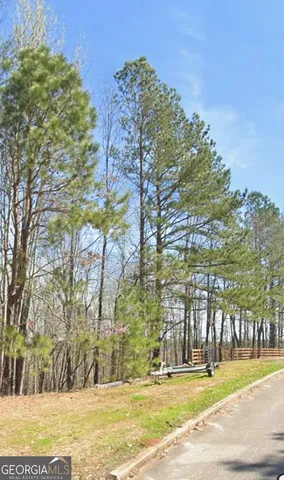 a view of snow on a road