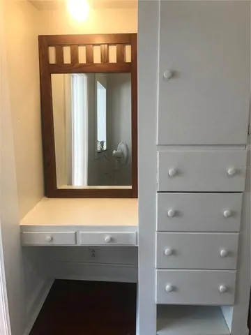 a bathroom with a mirror