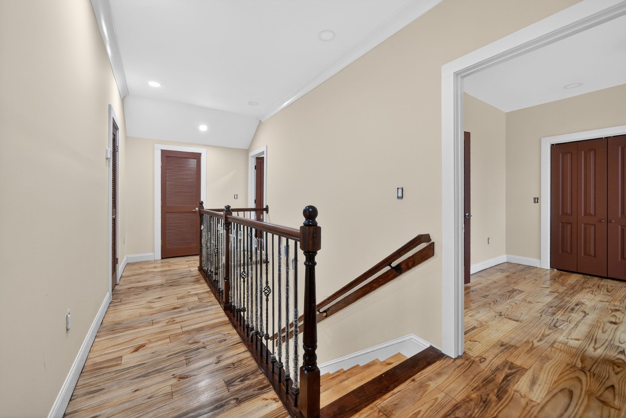 410 3rd Avenue Fayetteville, TN 37334 - Photo 32 of 49 a view of a hallway with wooden floor and stairs