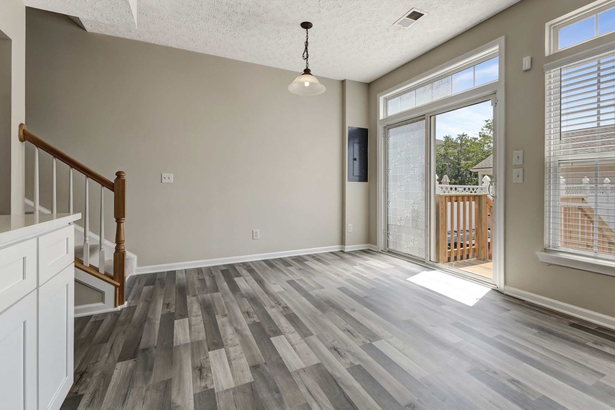 7714 Porter House Drive Nashville, TN 37211 - Photo 14 of 39 a view of an empty room with wooden floor and a window