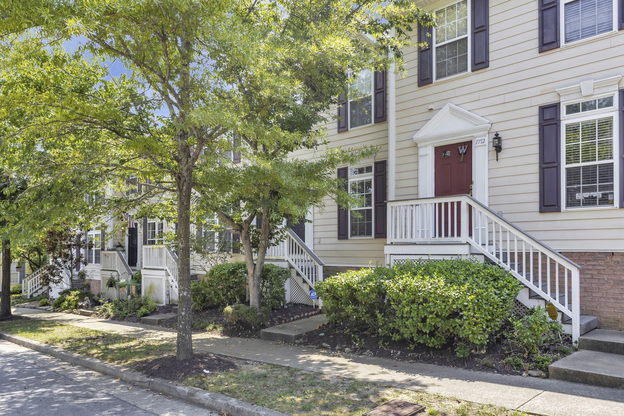7714 Porter House Drive Nashville, TN 37211 - Photo 2 of 39 a view of a house with a small yard