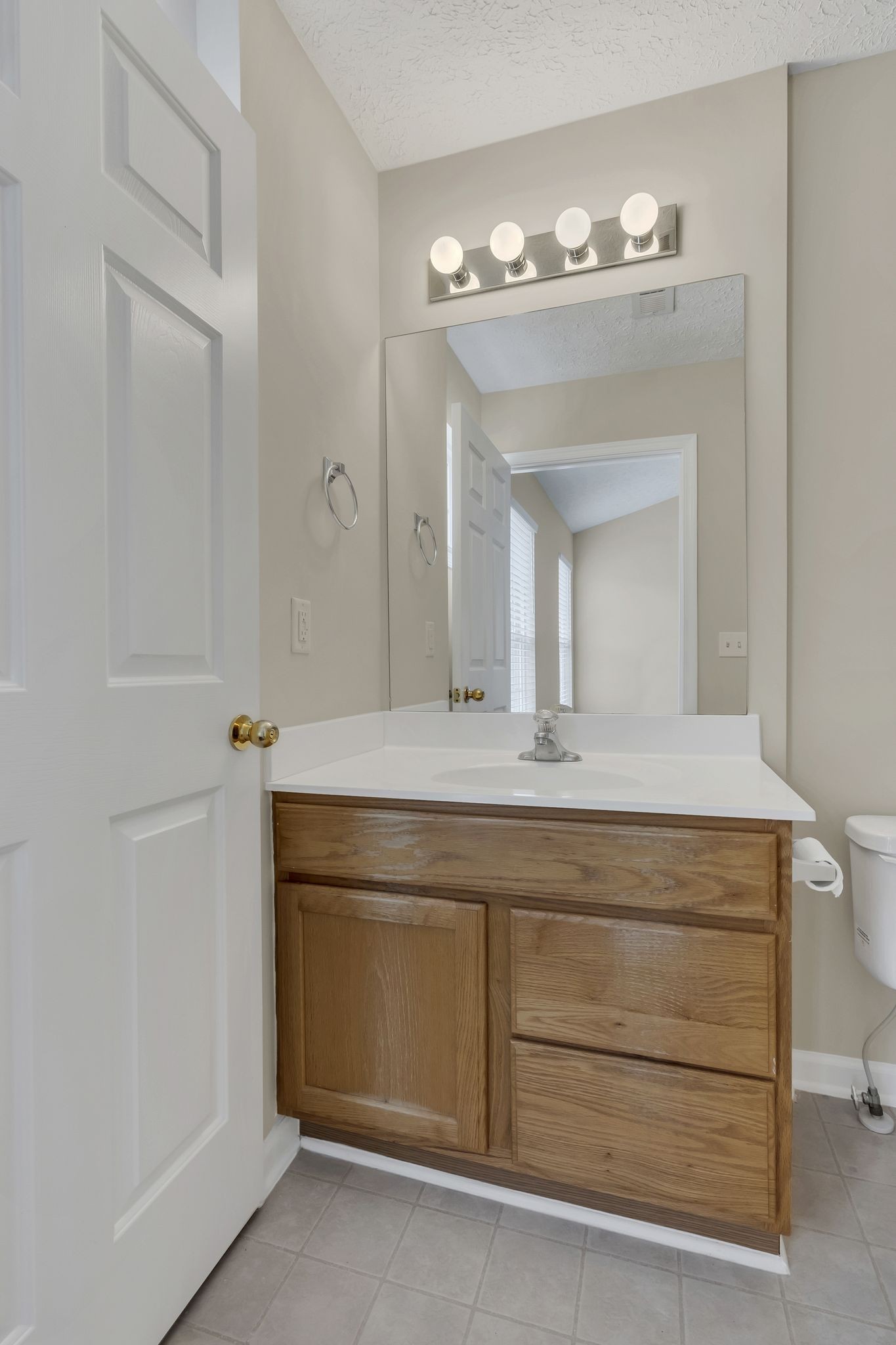 7714 Porter House Drive Nashville, TN 37211 - Photo 21 of 39 a bathroom with a sink and a mirror