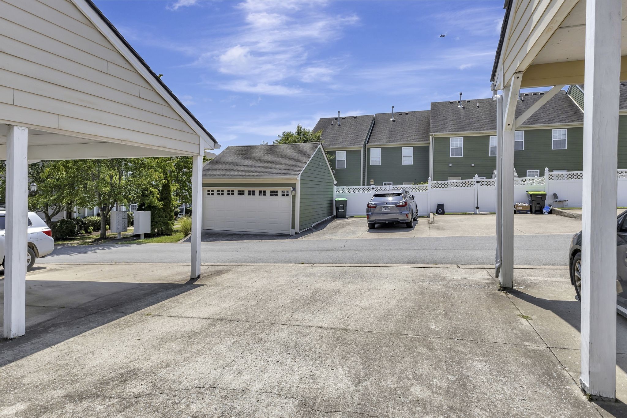 7714 Porter House Drive Nashville, TN 37211 - Photo 34 of 39 a view of a patio with a table and chairs and floor to ceiling window