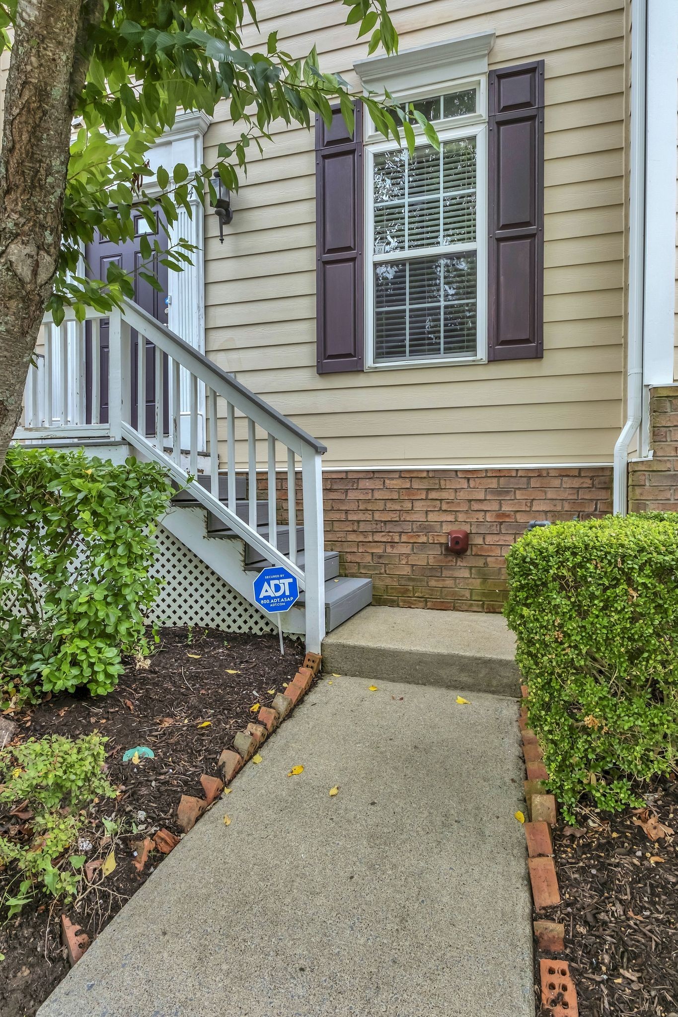 7714 Porter House Drive Nashville, TN 37211 - Photo 5 of 39 a front view of a house with a yard