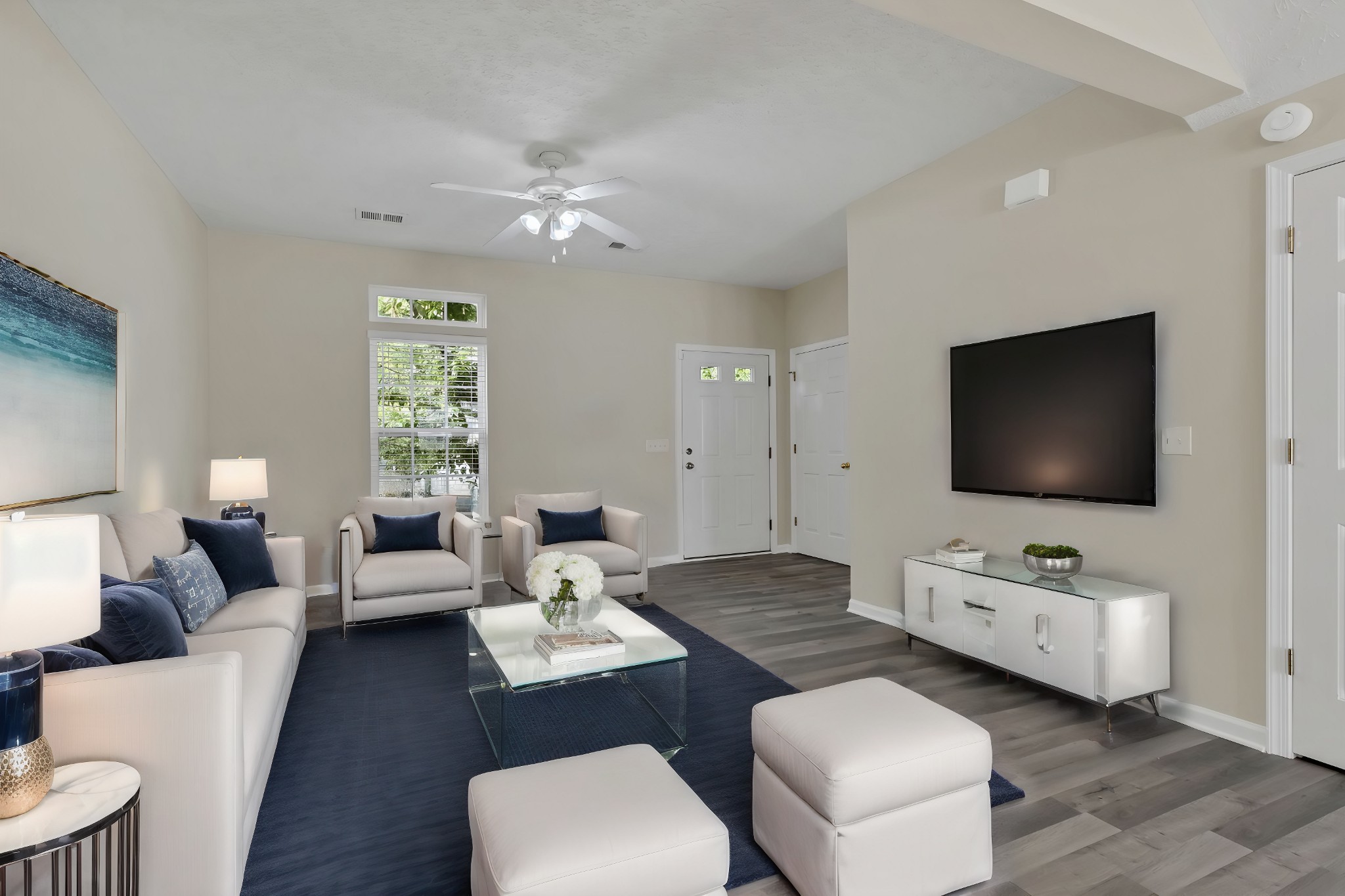 7714 Porter House Drive Nashville, TN 37211 - Photo 7 of 39 a living room with furniture and a flat screen tv