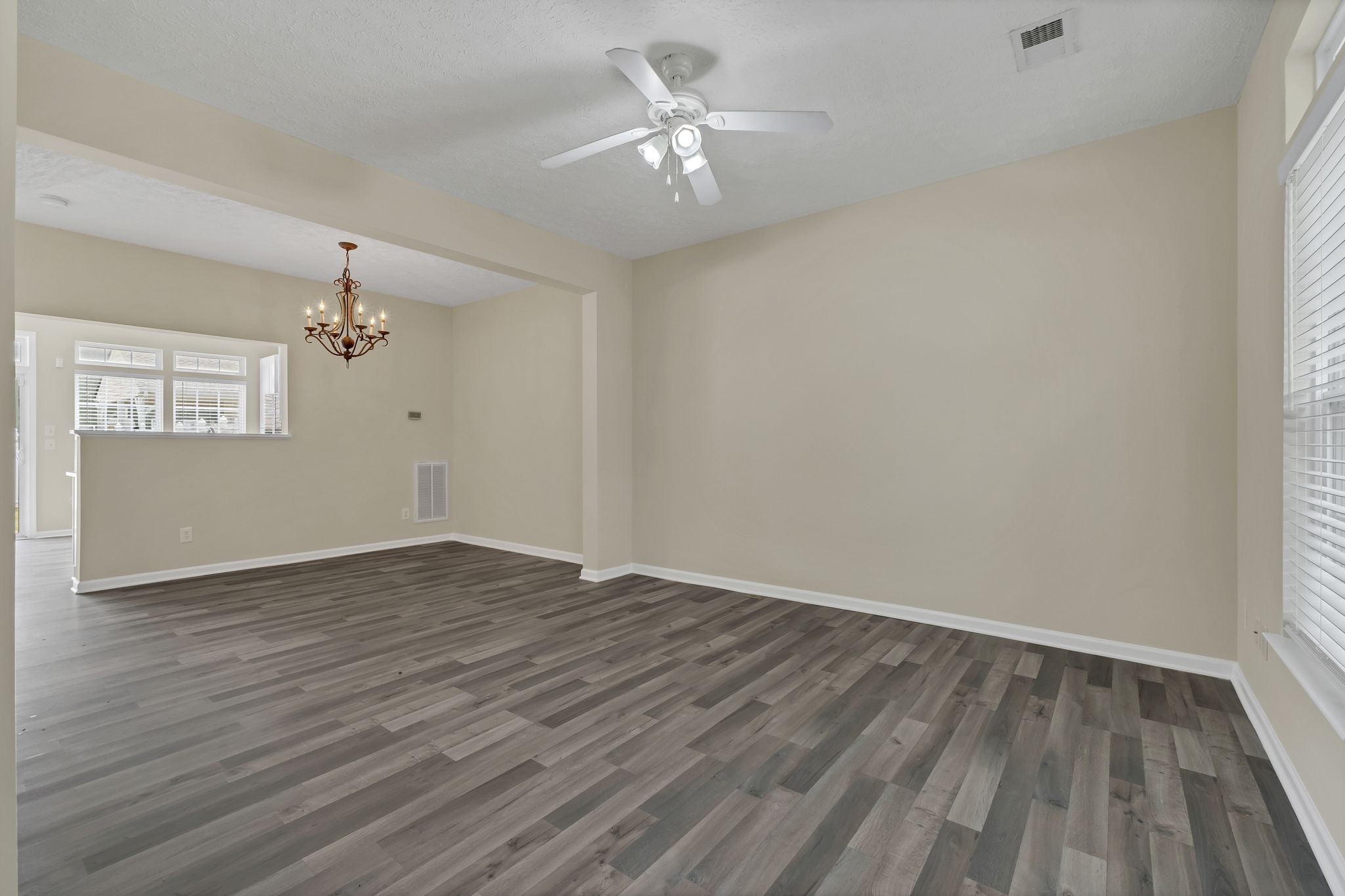7714 Porter House Drive Nashville, TN 37211 - Photo 9 of 39 wooden floor in an empty room with a window