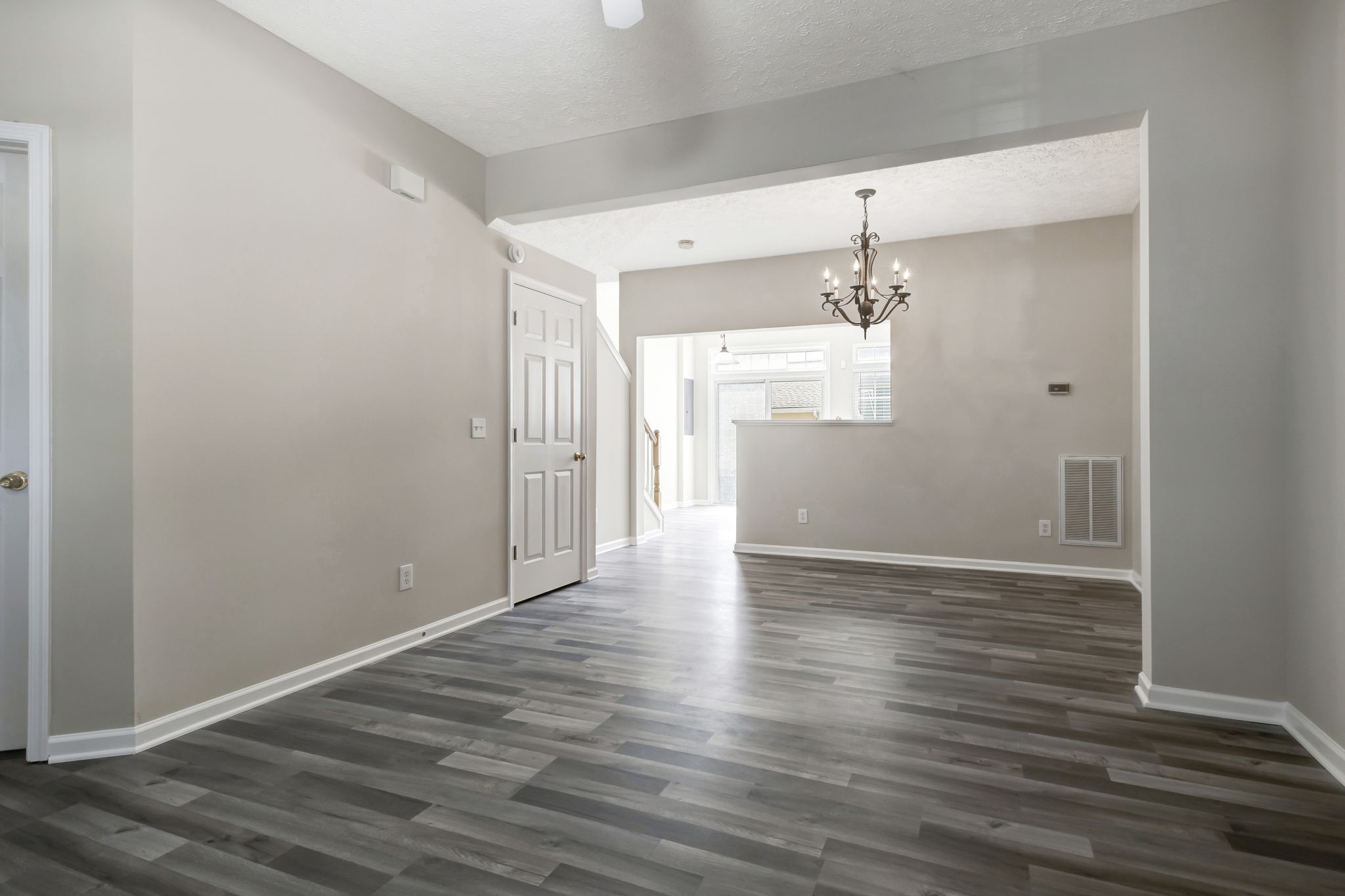 7714 Porter House Drive Nashville, TN 37211 - Photo 10 of 39 a view of an empty room with wooden floor and a window