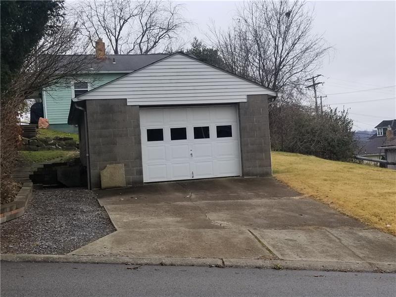 409 Harmony Road Baden, PA 15005 - Photo 2 of 11 Garage behind house on Bauman with 2 additional parking spots