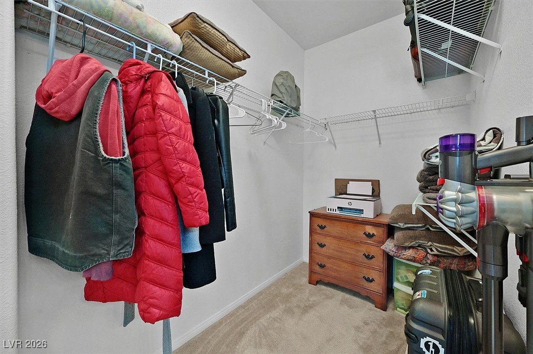 10550 West Alexander Road, Unit 2065 Las Vegas, NV 89129 - Photo 18 of 27 Spacious closet featuring light carpet