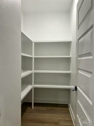 a view of an empty walk in closet