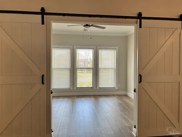 a white toilet and tub sitting next to a bathroom sink