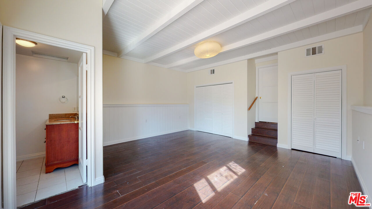 7865 Denivelle Road Sunland, CA 91040 - Photo 28 of 54 a view of empty room with wooden floor