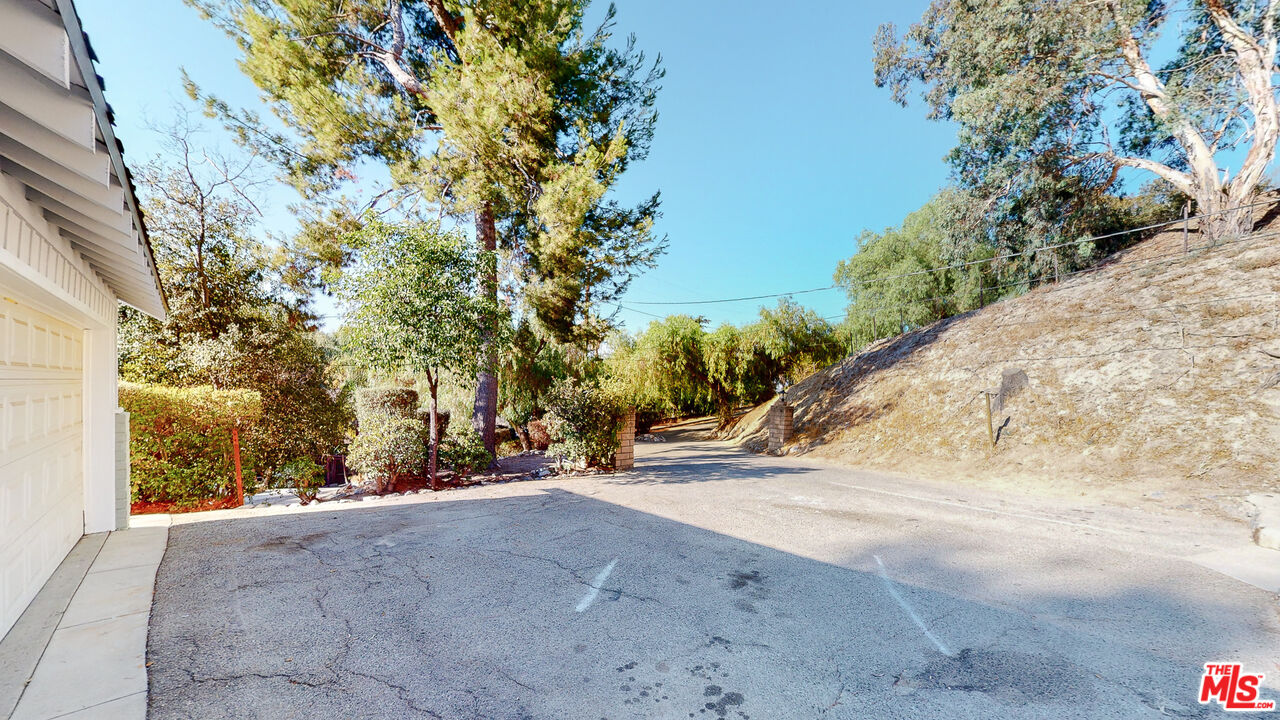 7865 Denivelle Road Sunland, CA 91040 - Photo 6 of 54 a view of road and trees around