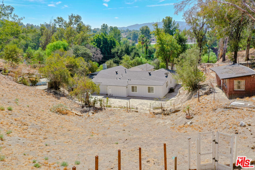 7865 Denivelle Road Sunland, CA 91040 - Photo 52 of 54 a view of a house with a yard