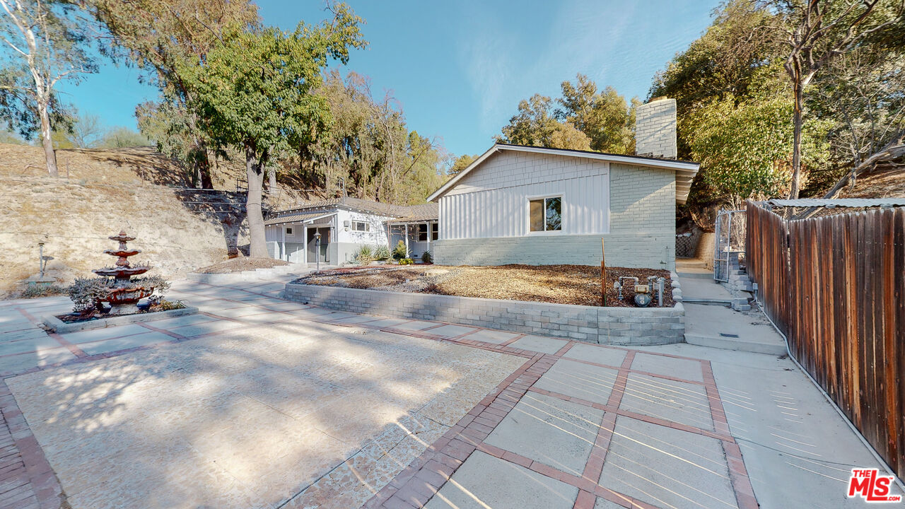 7865 Denivelle Road Sunland, CA 91040 - Photo 7 of 54 a view of a house with backyard