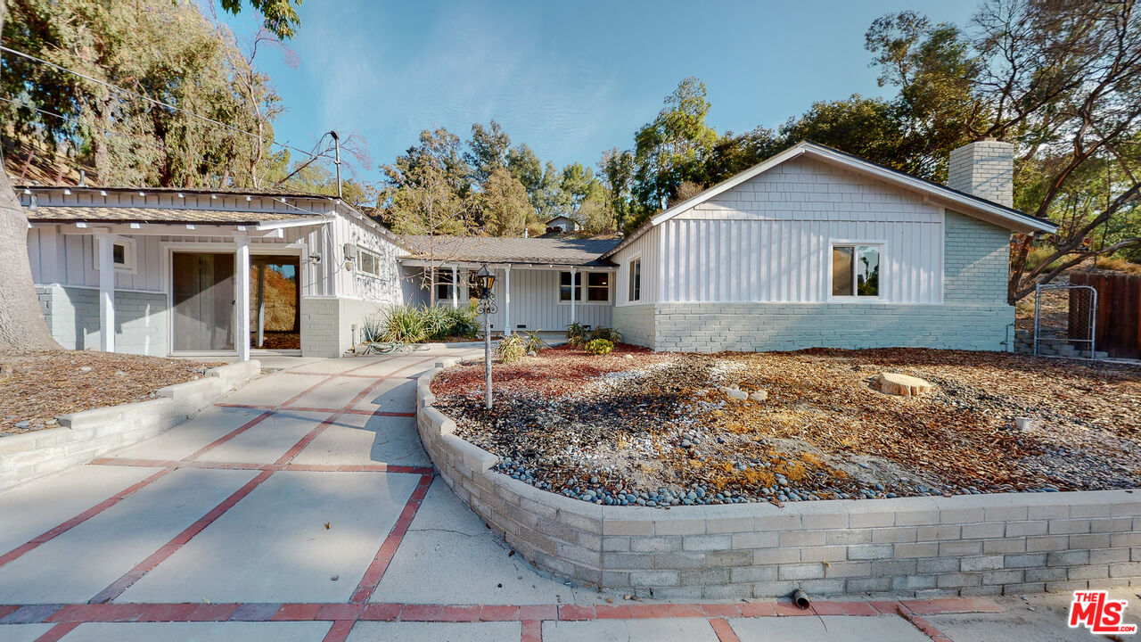 7865 Denivelle Road Sunland, CA 91040 - Photo 8 of 54 a house view with a outdoor space