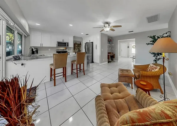 a dining room with a table and chairs
