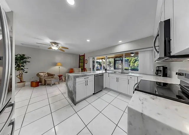 a living room with furniture and a couch