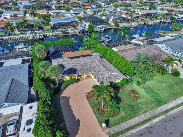 an aerial view of residential building and parking space