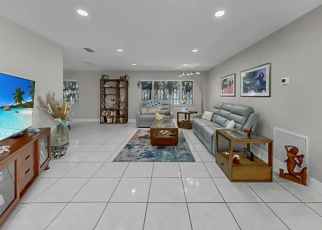 a view of a swimming pool with a patio