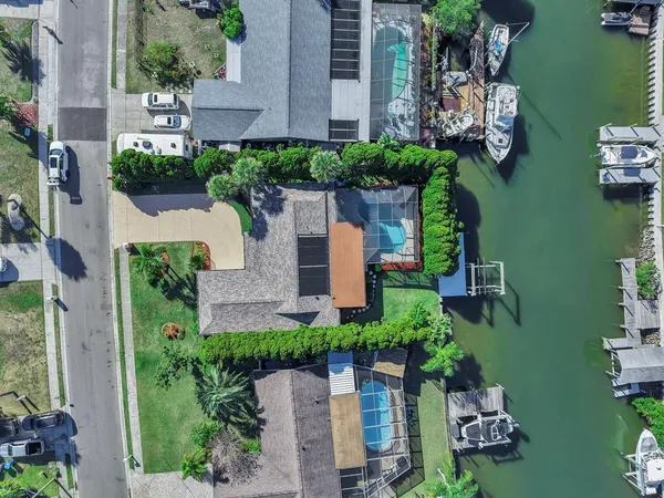 a view of a garden with a building in front of it