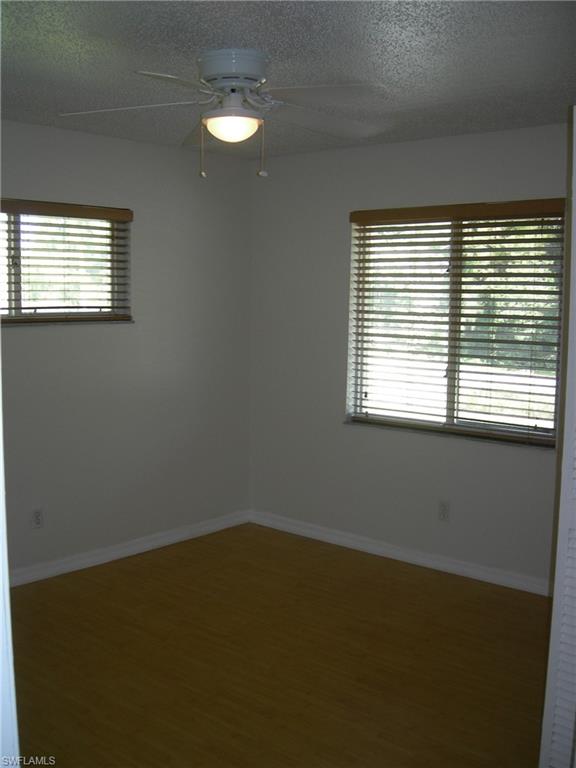 3491 County Barn Road, Unit E201 Naples, FL 34112 - Photo 8 of 15 a view of room and window