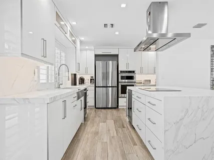 a swimming pool with outdoor seating and yard