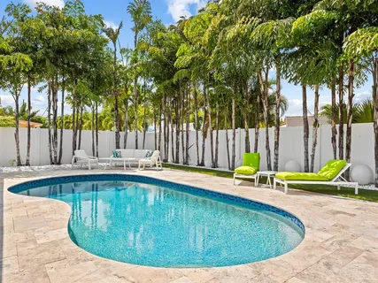 a view of outdoor space and swimming pool