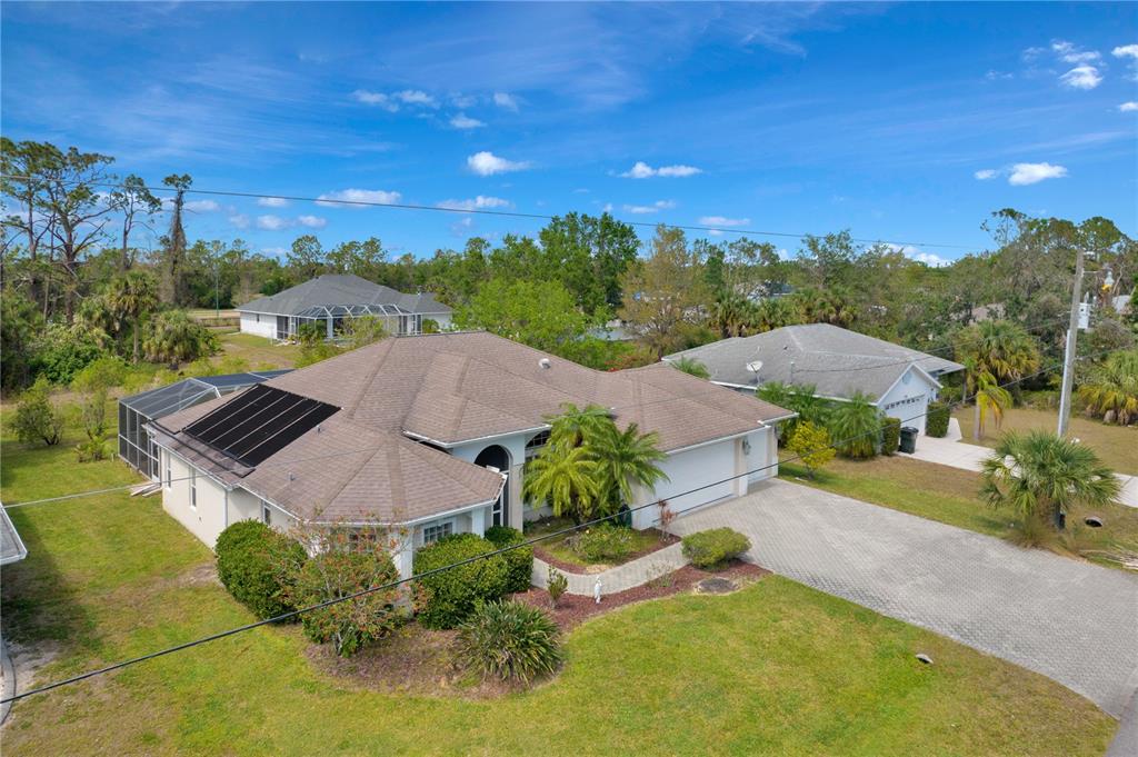 3801 Sesame Street North Port, FL 34287 - Photo 1 of 1 an aerial view of a house with a garden