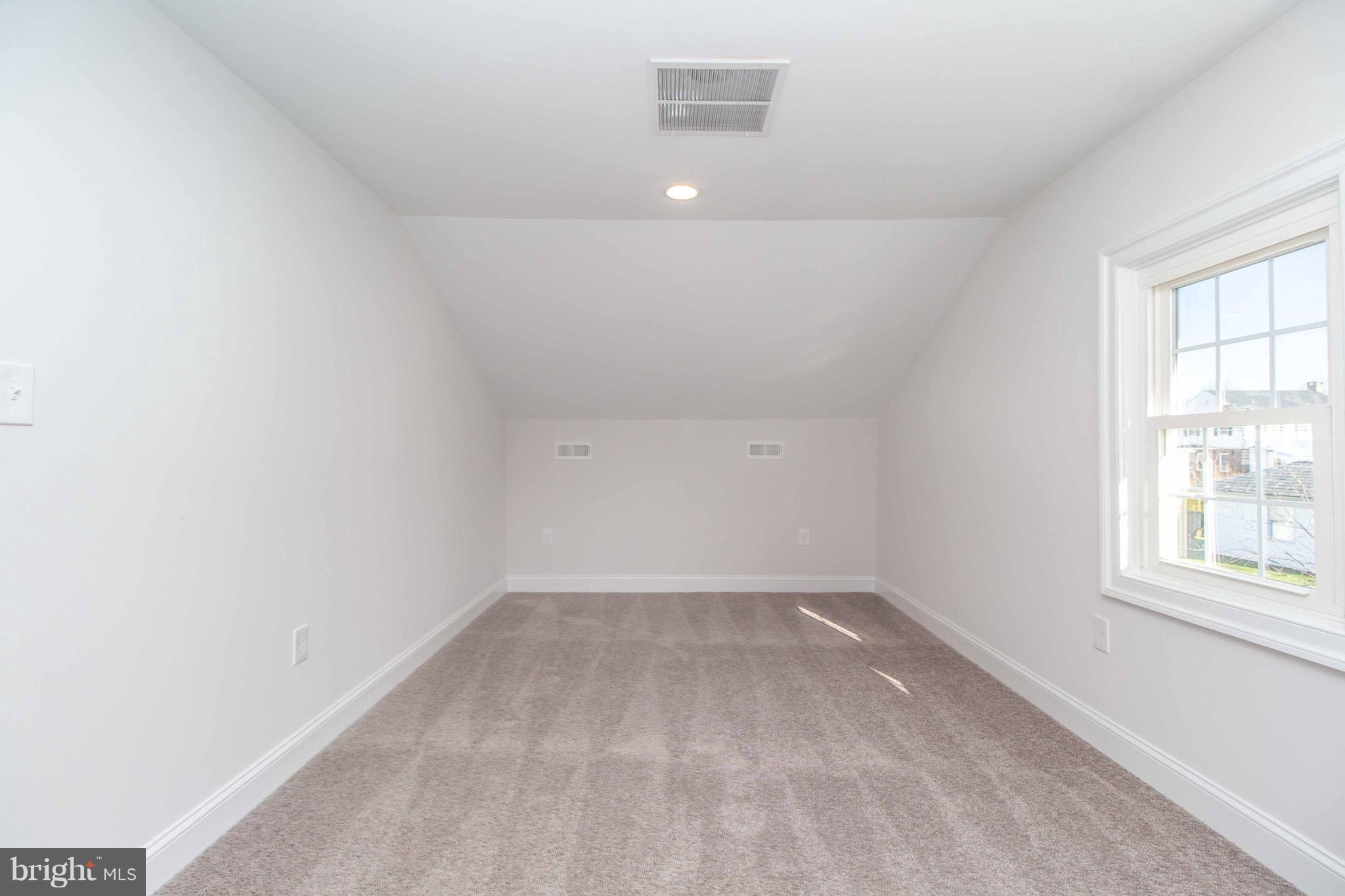 701 Brookwood Road Baltimore, MD 21229 - Photo 46 of 57 an empty room with a window