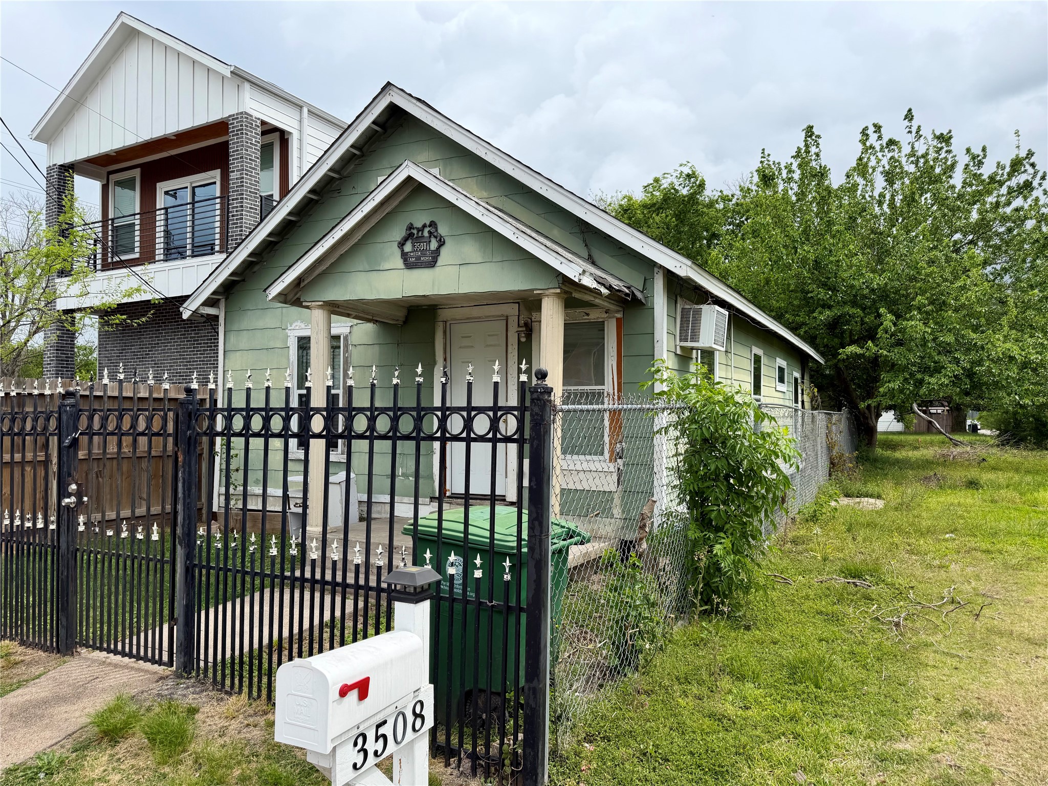 3508 Omega Street Houston, TX 77022 - Photo 2 of 15 a front view of a house with a yard