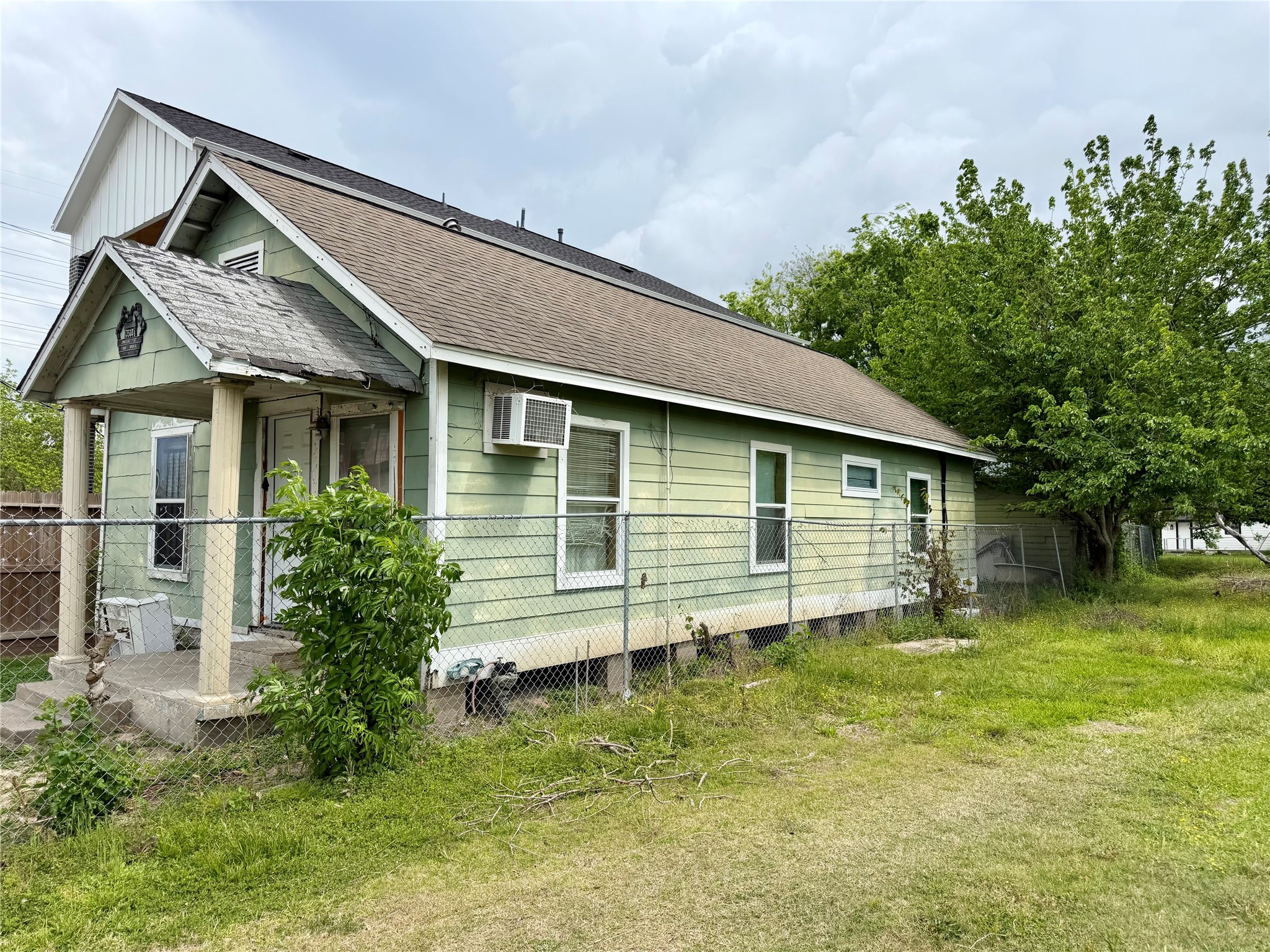 3508 Omega Street Houston, TX 77022 - Photo 4 of 15 a view of a house with a yard