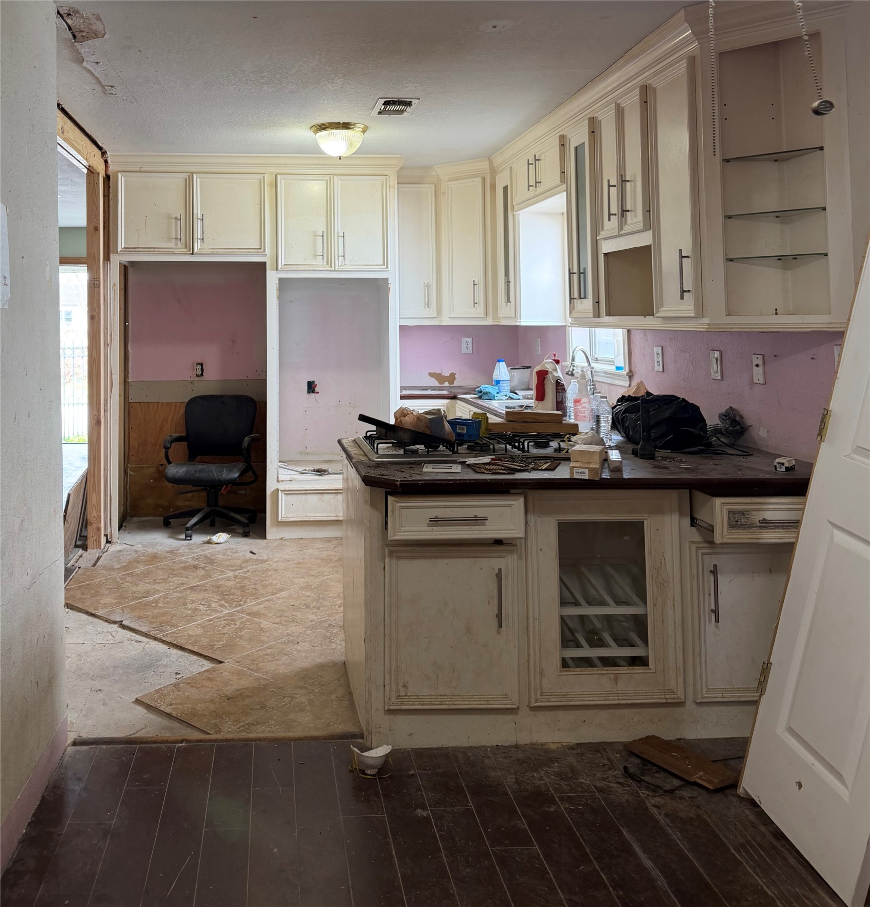 3508 Omega Street Houston, TX 77022 - Photo 5 of 15 a kitchen with a sink and cabinets