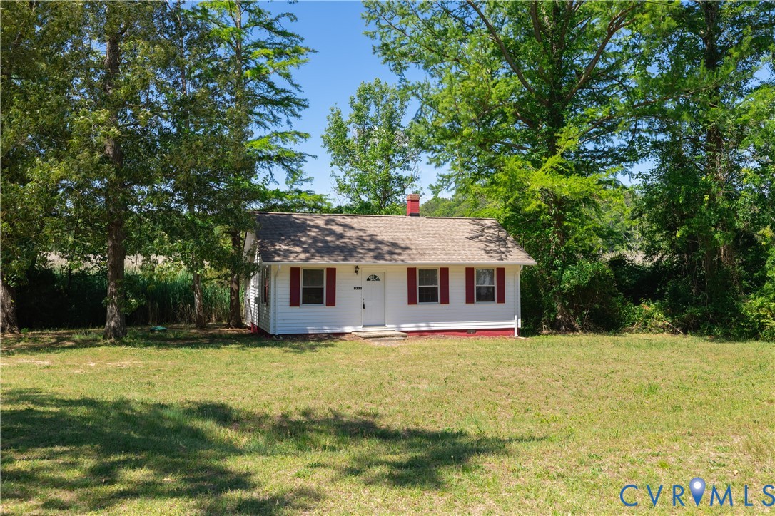 933 Pleasant Point Road Surry, VA 23883 - Photo 27 of 45 a view of a house with a yard