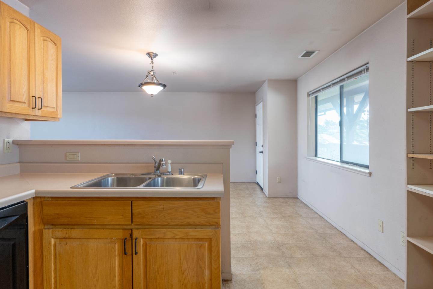 306 Reservation Road Marina, CA 93933 - Photo 11 of 23 a bathroom with a sink and a mirror
