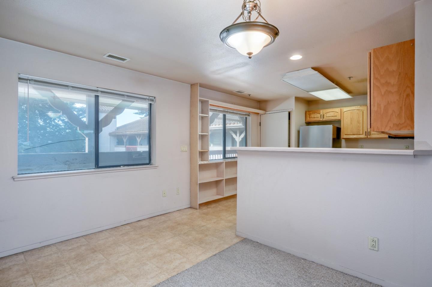 306 Reservation Road Marina, CA 93933 - Photo 13 of 23 a view of a kitchen and window