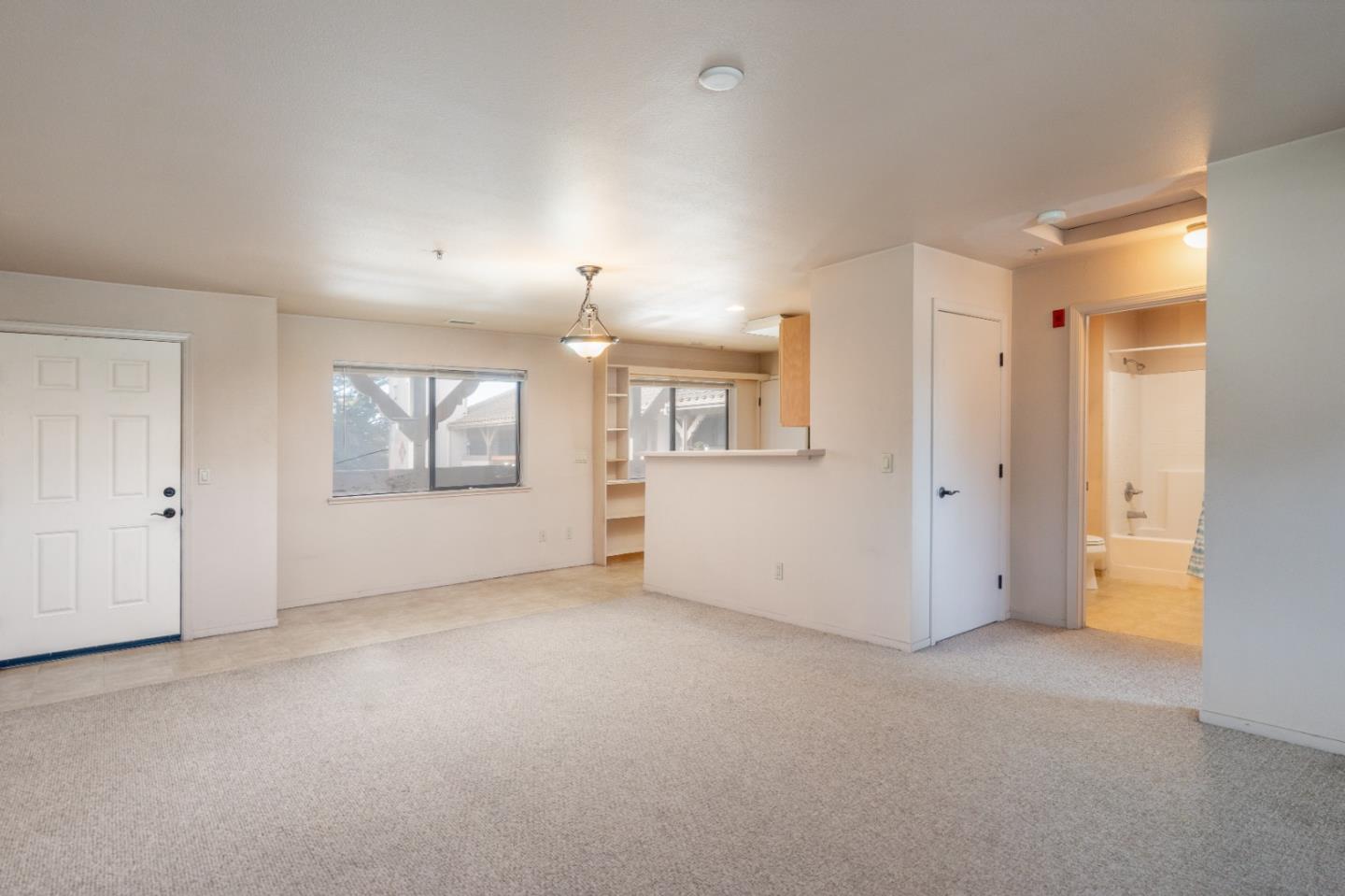 306 Reservation Road Marina, CA 93933 - Photo 17 of 23 an empty room with windows and closet