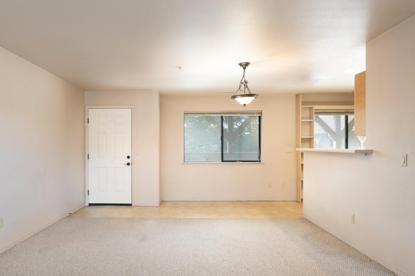 306 Reservation Road Marina, CA 93933 - Photo 18 of 23 a view of an empty room with a window