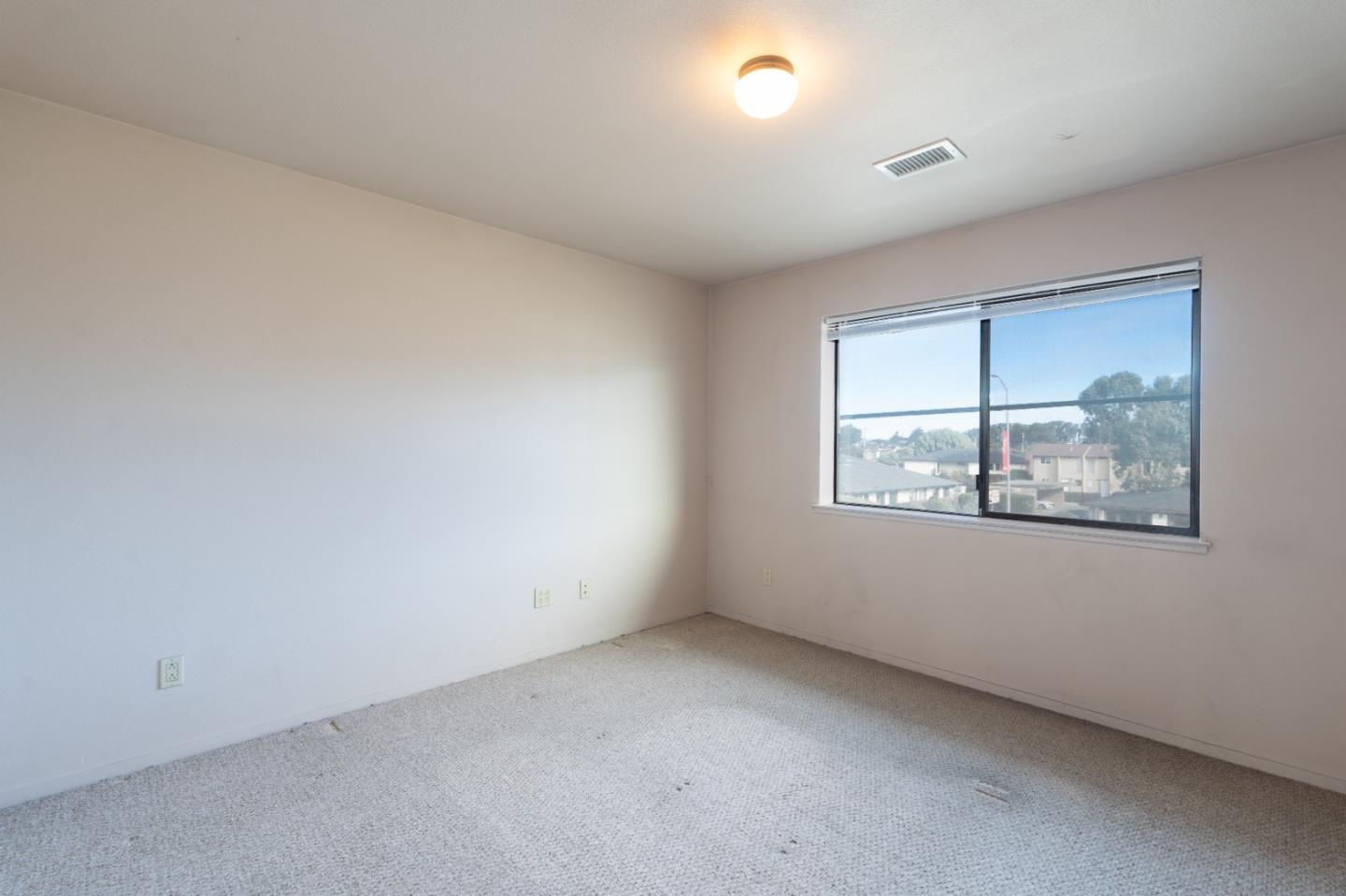 306 Reservation Road Marina, CA 93933 - Photo 20 of 23 an empty room with windows