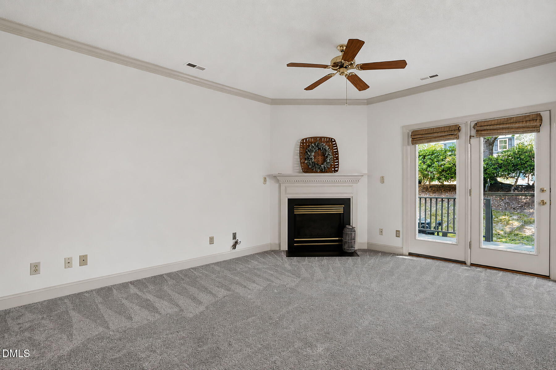 1210 Shadow Bark Court Raleigh, NC 27603 - Photo 11 of 29 a view of empty room with fireplace and window